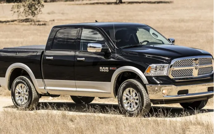 a black ram truck parked in a field Ridiculously Long Names a black ram truck parked in a field