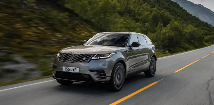a grey range rover driving down a mountain road Ridiculously Long Names
a grey range rover driving down a mountain road