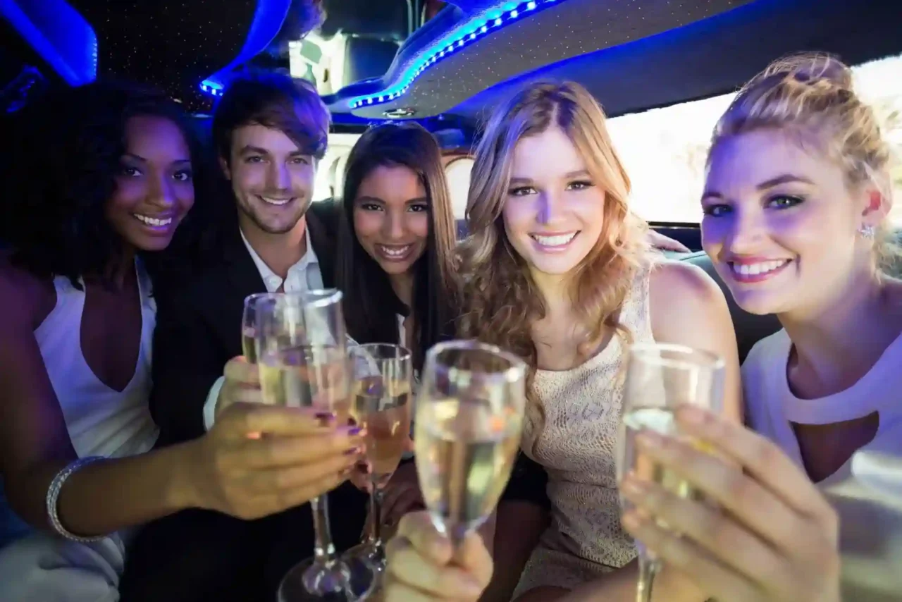 a group of people holding up wine glasses