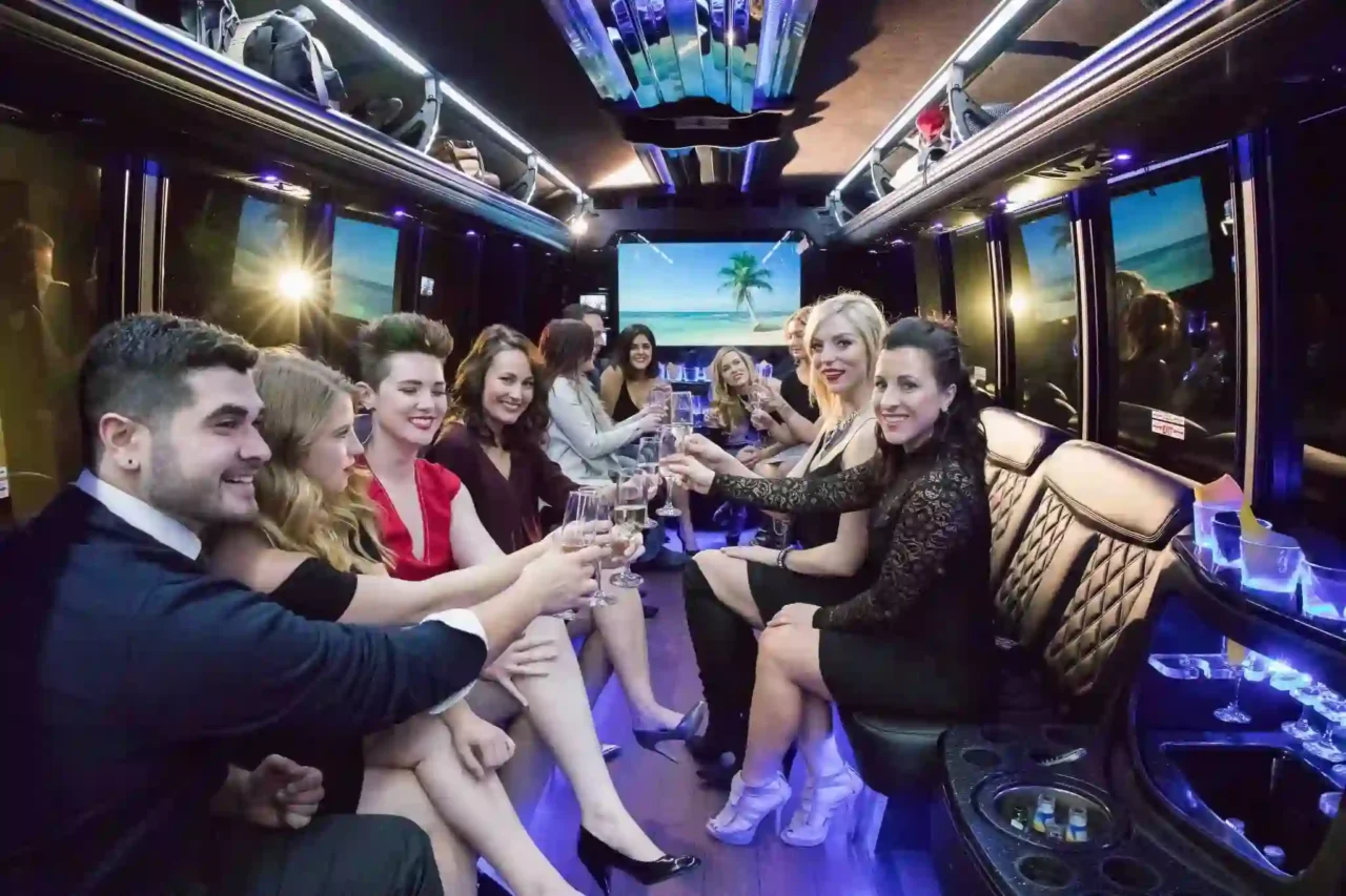 a group of people sitting on a bus All about your limos