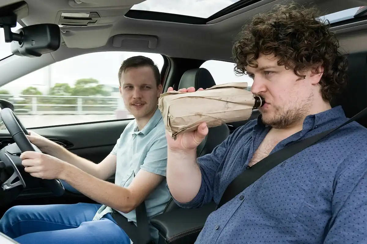 can passengers drink alcohol in a car