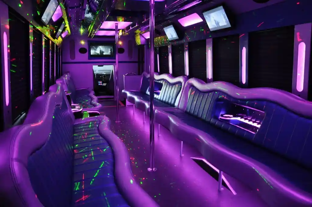 a party bus with purple and green lights