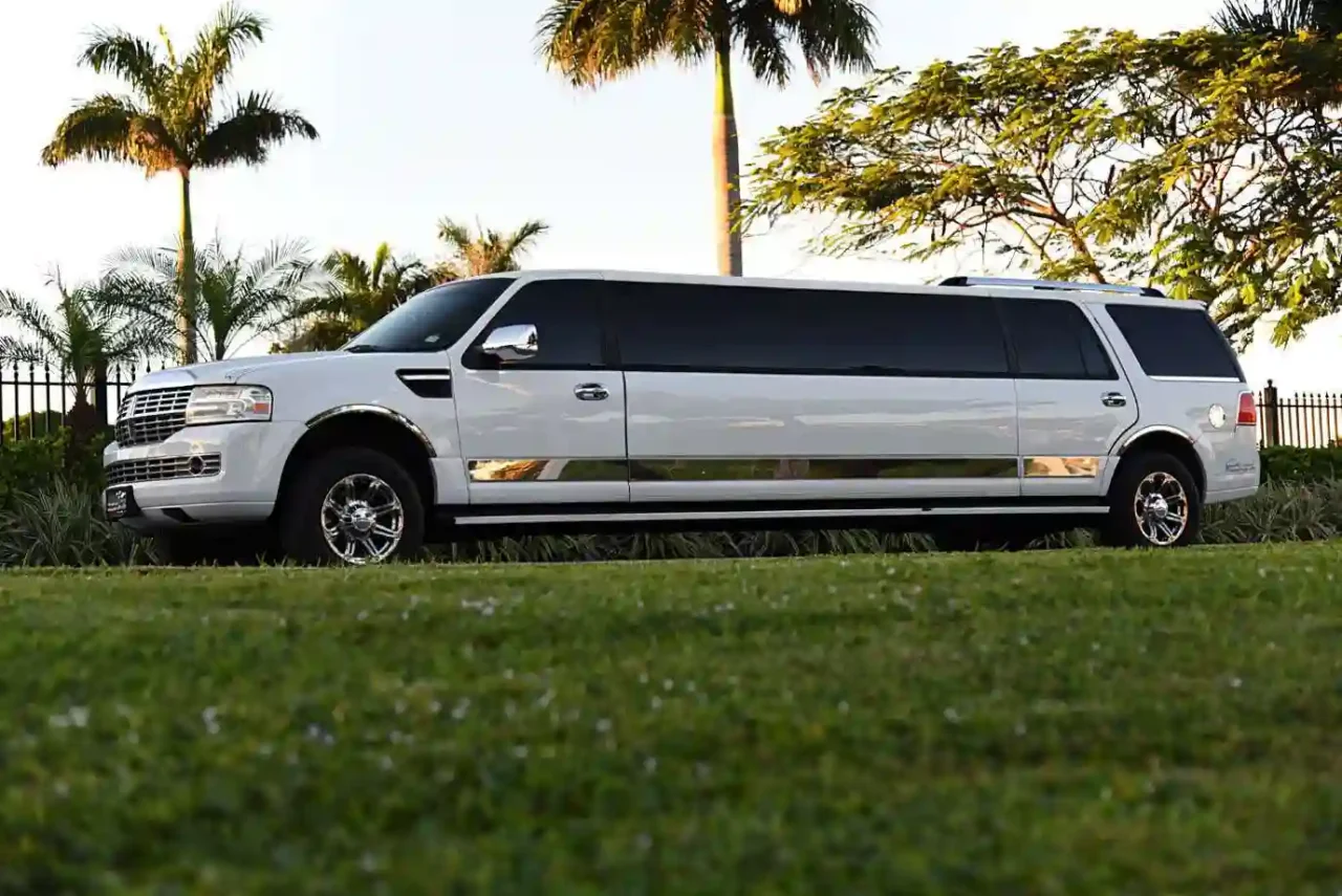 limo vs stretch limo a white limo is parked in the grass
